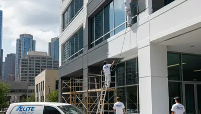 Professional commercial painters finishing office exterior in Wellesley, MA