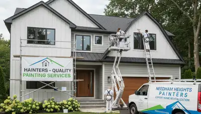 Professional house painters working on a freshly painted home exterior in Wellesley, MA